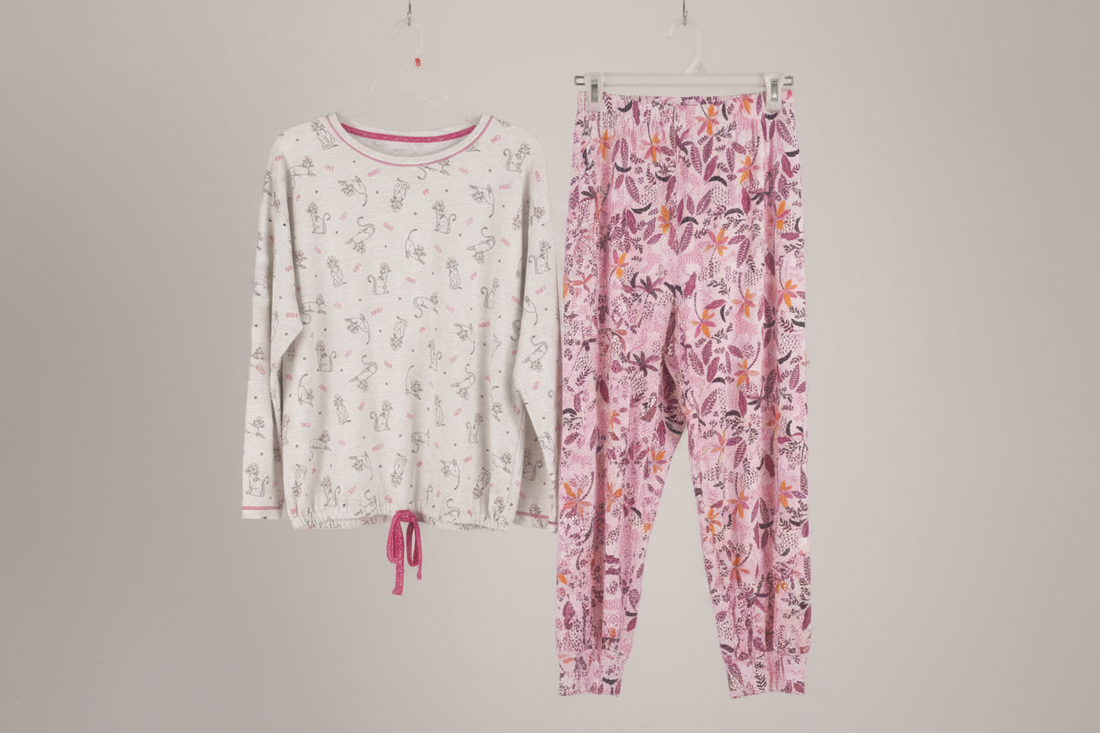 Floral pajama set with long-sleeve top and pants on a gray background