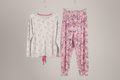 Floral pajama set with long-sleeve top and pants on a gray background