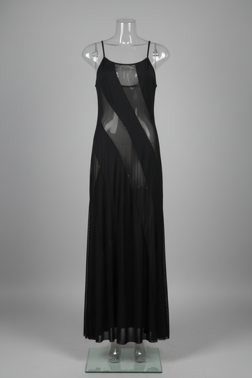 Black dress on a mannequin against a white wall.