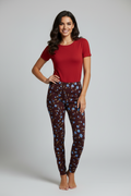Brown leggings with blue floral pattern on a white background