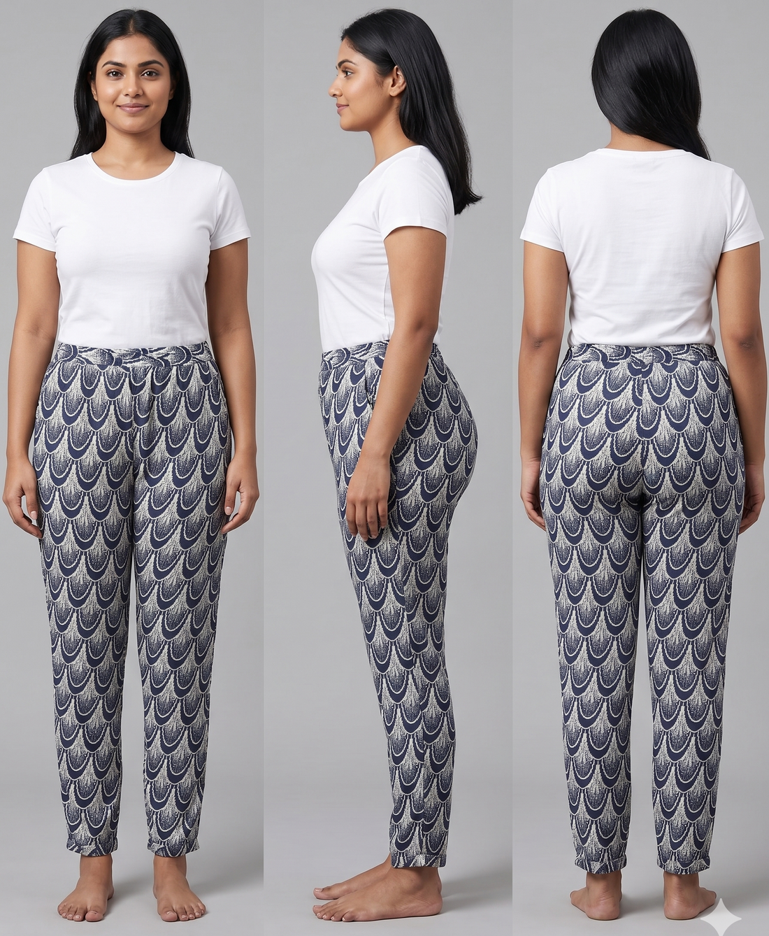 Patterned pants hanging on a rack against a white wall