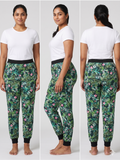 Woman wearing a white t-shirt and green floral pants, shown from front, side, and back views.
