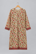 A beige long-sleeve tunic dress with a red and orange floral print and patterned borders, hanging on a black hanger against a white wardrobe door.